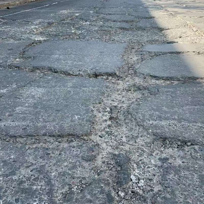 海门路面起砂露石子修补料